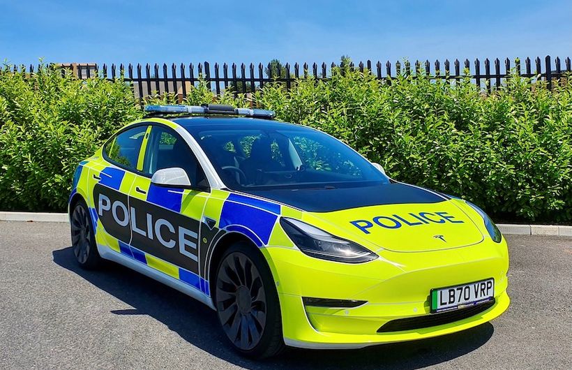 Tesla Model 3 police car in UK, front static shot. 